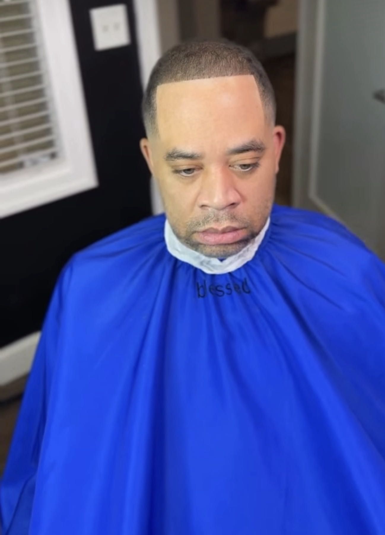 Clean fade haircut by Larry The Barber