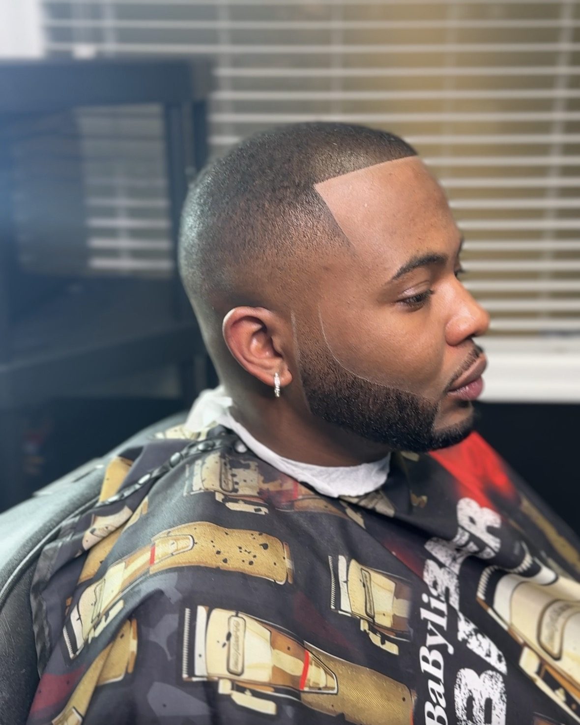Bald fade with sharp lineup by Larry The Barber