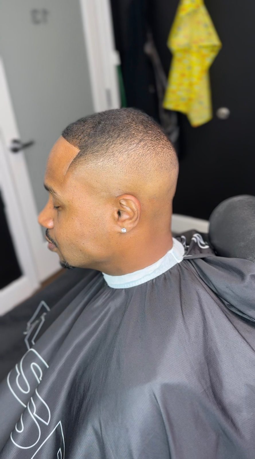 Clean buzz fade by Larry The Barber