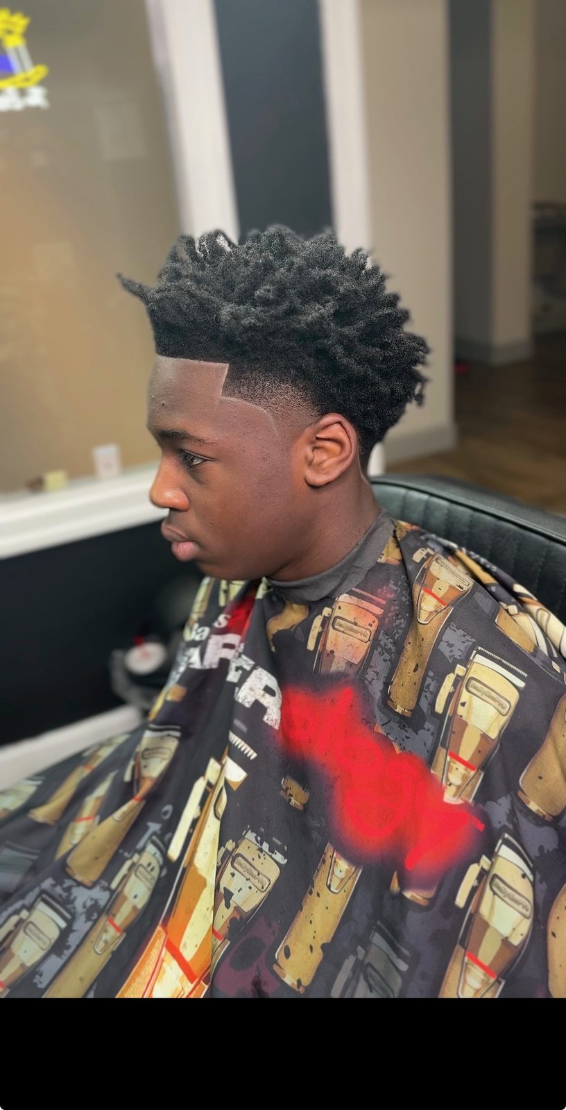 Teen high-top fade cut by Larry The Barber